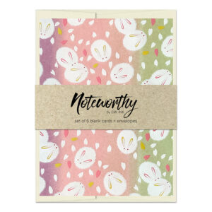 Pastel bunny washi note card set with soft pink, lavender, and sage green watercolor background and scattered sakura petals by Emi Ink