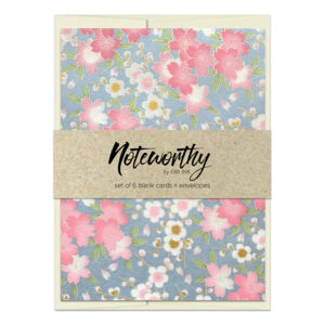 Asami Blue washi note card set featuring sakura and ume blossoms on a soft denim-blue background with gold accents, packaged with kraft band