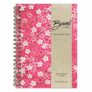 Misaki wire-bound Japanese washi notebook with layered sakura and flowing gold lines on a rich pink chiyogami background