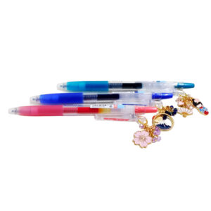 Full view of Hanami Charm Pen Trio by love MIREI with kokeshi doll, Fuji-san, fan, and sakura enamel charms
