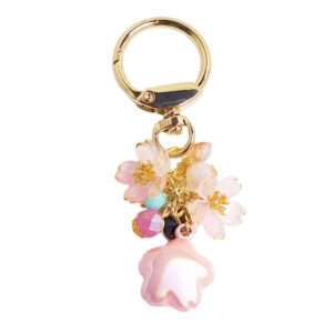 Sakura cluster keychain with enamel flowers, pink sakura bell, and glass bead accents by love MIREI
