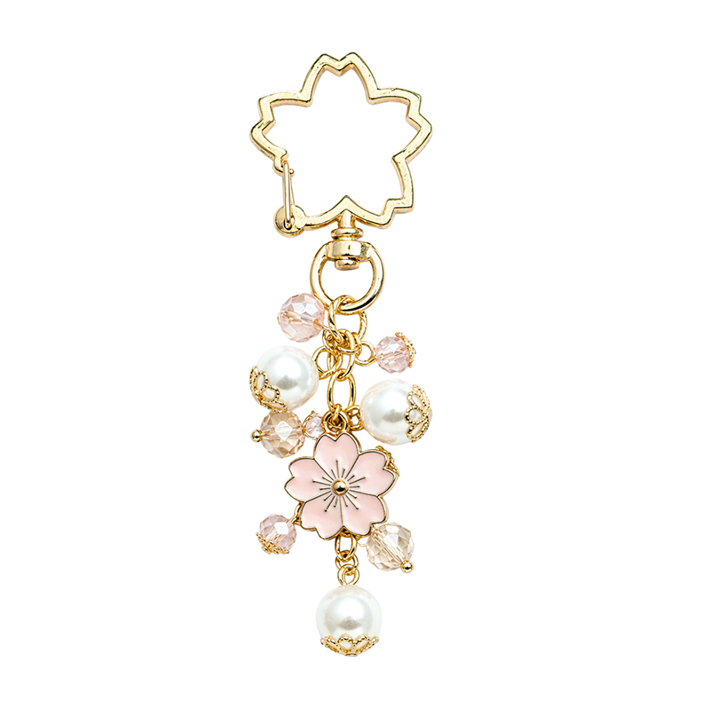 Sakura glam bag charm with pink enamel flower, pearl beads, and gold sakura clasp by love MIREI