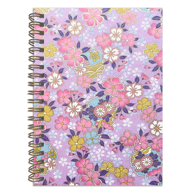 Suzuha Lavender washi notebook cover with multicolor sakura blossoms in pink, yellow, and blue on soft lavender background