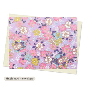 Suzuha Lavender Washi Note Card with multicolor sakura blossoms in pink, yellow, and blue on soft lavender background with subtle gold accents