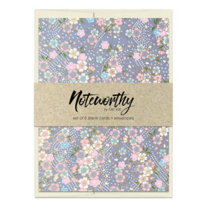 Yuka Gray Washi Note Card Set with scattered sakura blossoms in pink, blue, and cream on soft gray background with subtle gold accents