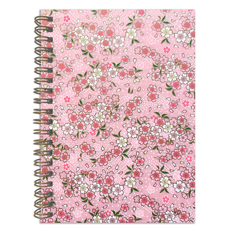 Yuka Pink washi notebook cover with scattered sakura blossoms in pink, blue, and cream on soft blush pink background