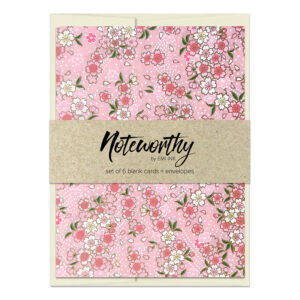 Yuka Pink Washi Note Card Set with scattered sakura blossoms in pink, blue, and cream on soft blush pink background with subtle gold accents