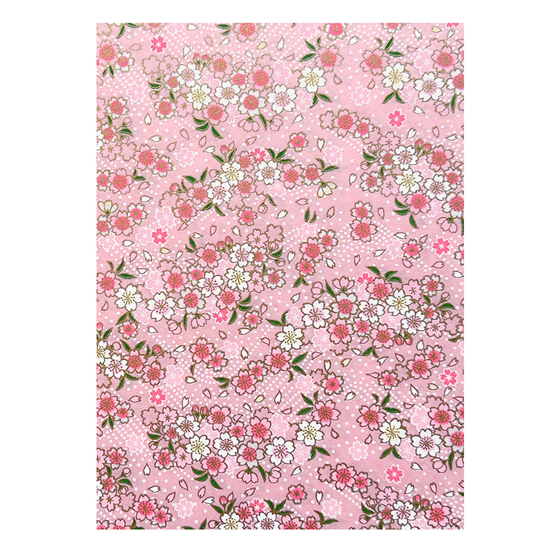 Yuka Pink washi pattern with scattered sakura blossoms in pink, blue, and cream on soft blush pink background with subtle gold accents