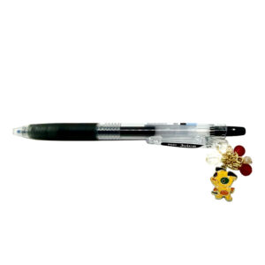 Dog zodiac charm pen by love MIREI featuring an enamel dog charm, red bead accents, and black Pilot Juice gel pen