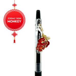 Close-up side view of Monkey zodiac charm pen by love MIREI with enamel monkey charm and coordinating bead accents