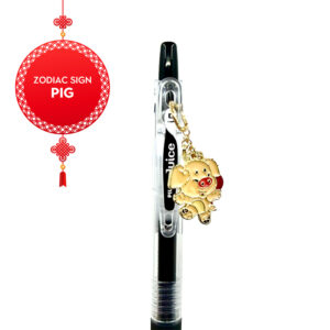 Close-up side view of Pig zodiac charm pen by love MIREI with enamel pig charm and coordinating bead accents