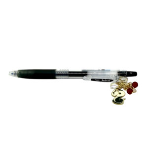 Snake zodiac charm pen by love MIREI featuring an enamel snake charm, red bead accents, and black Pilot Juice gel pen