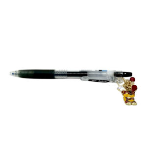 Tiger zodiac charm pen by love MIREI featuring an enamel tiger charm, red bead accents, and black Pilot Juice gel pen