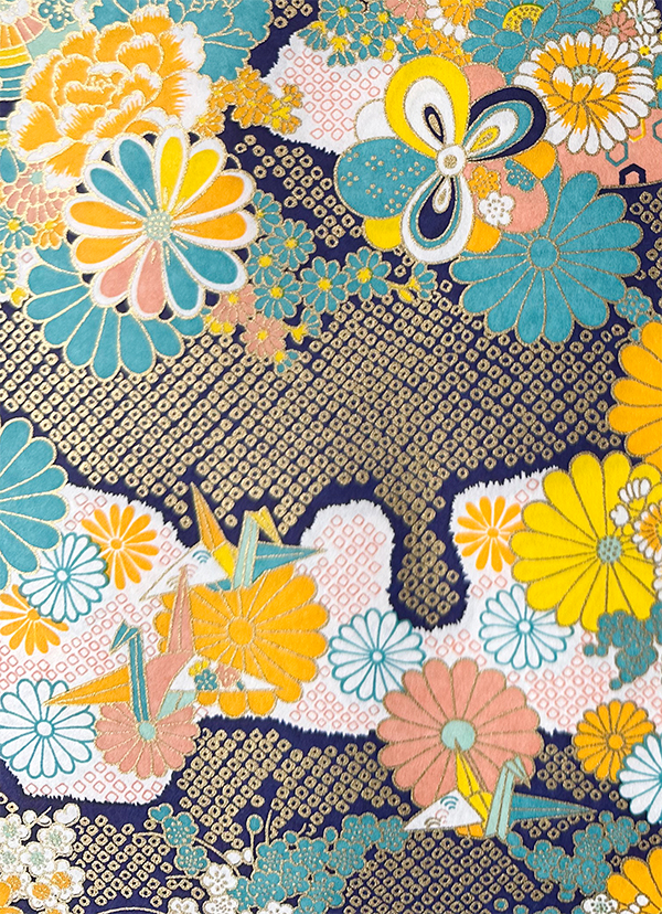Navy Japanese chiyogami pattern with cranes, kiku flowers, teal and yellow blooms, peach accents, and metallic gold details.